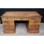 Victorian carved oak pedestal desk with leather skiver, 78cm high and 158cm wide.