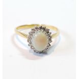 Opal and diamond oval cluster ring, in 18ct gold.