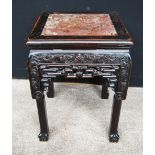 Chinese red marble topped carved wood jardiniere stand, 48cm high.