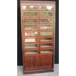 Edwardian mahogany Dudley & Co Ltd draper's cabinet, the centre section with glazed compartments,