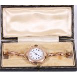 1940's ladies 9ct gold wristwatch, with Roman enamel dial, later crown, expanding bracelet.