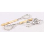 Silver mustard, a silver pepper and a pair of ivory handled silver plated salad spoons.