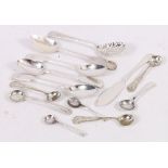 Victorian embossed silver preserve spoon, four fiddle pattern teaspoons,