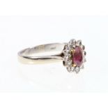 18ct white gold pink sapphire and diamond cluster ring, marked '18K' and hallmarked.