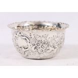 Silver sugar bowl, of circular form, with chased and embossed c-scroll foliate decoration,