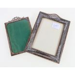 Silver rectangular photograph frame, with ribbon crest, 15cm and another silver frame, 18cm.