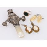 Silver and mother-of-pearl teething rattle, 8cm, a bloodstone set signet ring,