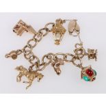 9ct gold curblink charm bracelet, with seven hallmarked charms, 43g gross.