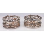 Pair of Martin Hall & Co. silver plated wine coasters, 13cm.