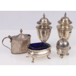 Pair of urn shaped silver peppers, Birmingham 1906, an oval mustard, a salt and a single pepper,