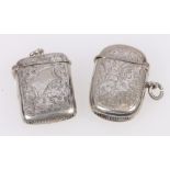 Two foliate engraved silver vesta cases, of rectangular form,