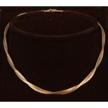 9ct gold textured and articulated link necklace.