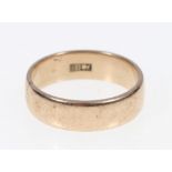 Yellow gold wedding band stamped 9ct. 7.