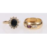 Yellow metal gem set ring,