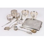 Silver engine turned cigarette case, sugar tongs, fob seal, teaspoons and napkin rings,