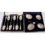 Set of four Edwardian silver shell salts, Birmingham 1905, cases,