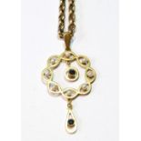 Gold and pearl circular openwork pendant with drop, '9ct', on necklet.