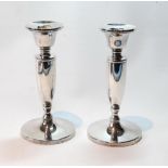 Pair of table candlesticks on inverted baluster stems, 16.5cm, loaded.