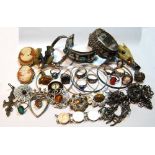 Various rings, eight bangles, a necklet with six tassels and various other items, mostly silver.