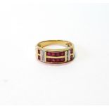 Eternity ring with rubies, probably 18ct gold. Condition Report Size L, 2.