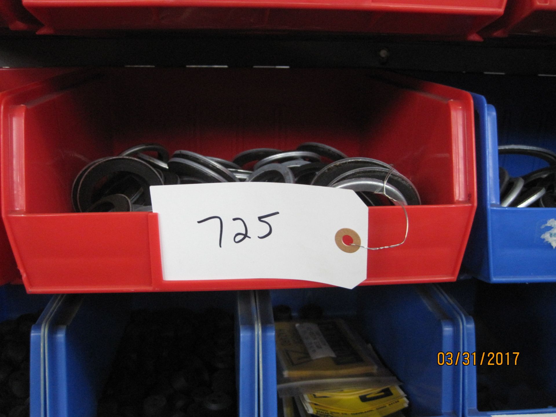 Akro-Mills Bin Rack with bins of Electrical conduit gaskets and hardware 35x42x75