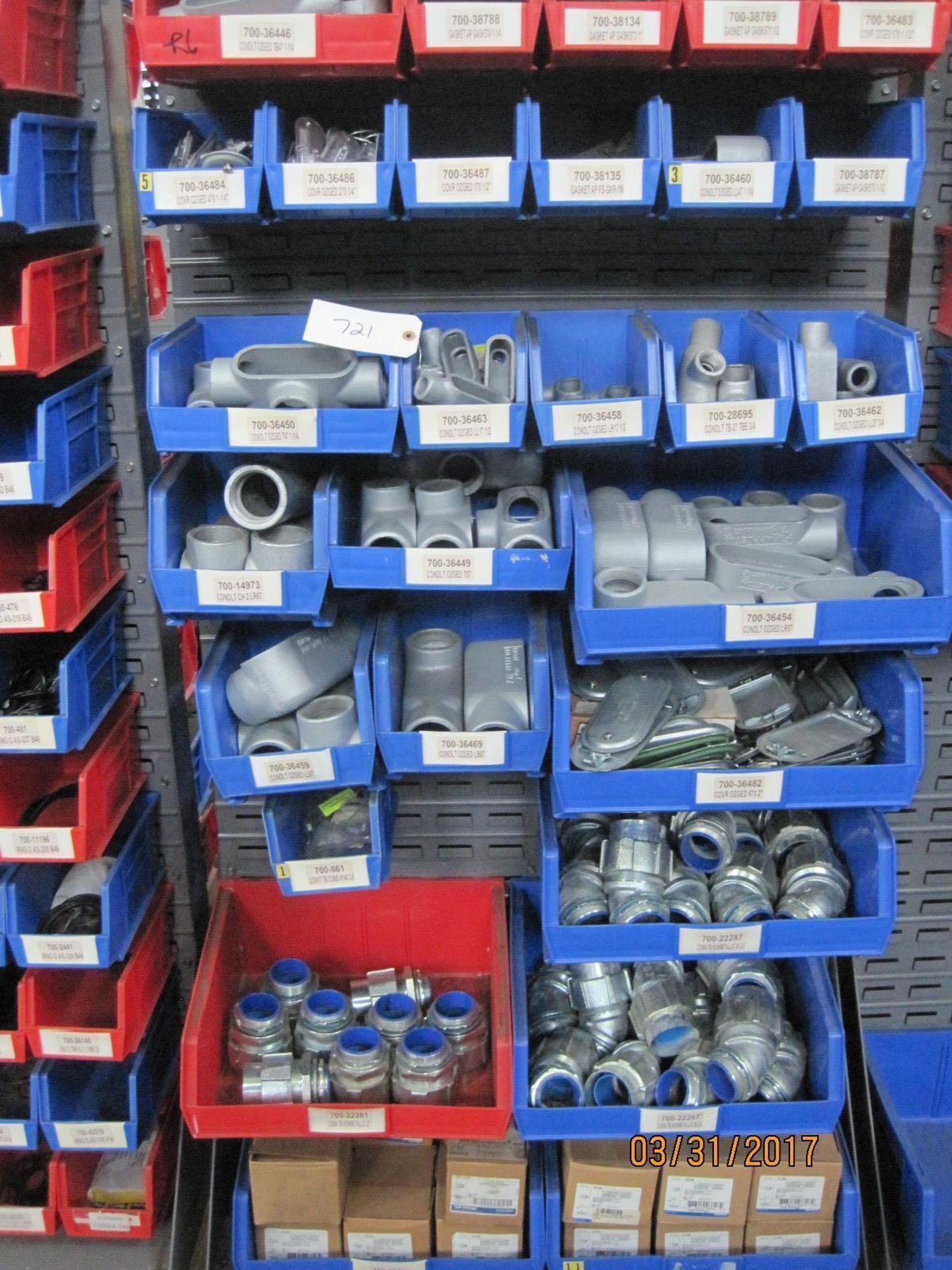 Akro-Mills Bin Rack with bins of Electrical conduit, seal tight connectors, covers, and etc.