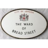 A City of London WARD BOUNDARY SIGN 'The Ward of Bread Street'. An oval enamel sign in its