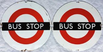 A pair of London Transport enamel 'DOLLY' BUS STOP PLATES as used by LT for temporary bus stops,