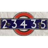 London Underground enamel 'bullseye' STOCK-NUMBER PLATE from R49 sub-surface (District Line) stock