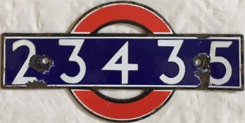 London Underground enamel 'bullseye' STOCK-NUMBER PLATE from R49 sub-surface (District Line) stock