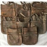 Quantity of London Transport bus conductors' leather CASH BAGS in varying states of repair and