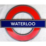 London Underground enamel STATION ROUNDEL SIGN from Waterloo station. A modern "silhouette"
