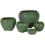 American Arts & Crafts, jardinieres and vases, five, matte green glazed ceramic, largest: 9"dia x