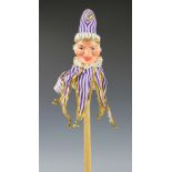 A papier mache stick puppet of Punch, late 19th/early 20th century,