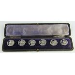 A cased set of six silver buttons, Jones and Crompton, Birmingham 1897,