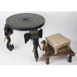 A large Anglo-Indian carved and stained wood elephant table,