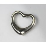 An Elsa Peretti for Tiffany and Co silver open heart pendant, bearing facsimile signature, '.
