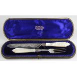 A cased silver knife and fork Hilliard and Thomason, Birmingham 1897,