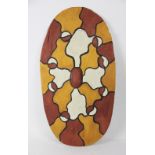 An Aboriginal pained carved wood Rainforest shield,