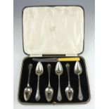 A cased set of six silver grapefruit spoons, C W Fletcher & Son Ltd, Sheffield 1935,