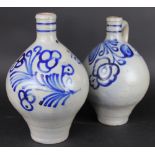 A pair of German Westerwald type, stoneware bottles, 19th century, each of bulbous form,