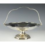 A silver basket George Wish Ltd, Sheffield 1910, of pedestal,