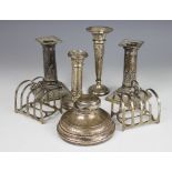 A pair of silver candlesticks, Elkington & Co, Sheffield 1937,