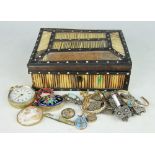 A Porcupine quill box enclosing a selection of jewellery to include a Topaz set bangle,