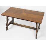 A Spanish style oak side table / coffee table,