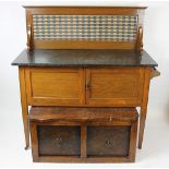 An Edwardian golden oak wash stand, with marble top and two cupboard doors,