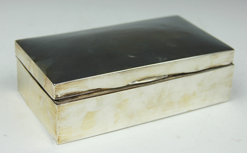A silver cigar box, Birmingham 1911, of plain polished,