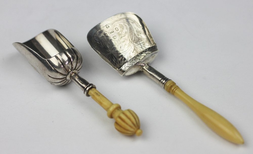 A William IV silver caddy shovel, Birmingham 1831 probably John Lawrence, with turned ivory handle,