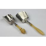 A William IV silver caddy shovel, Birmingham 1831 probably John Lawrence, with turned ivory handle,