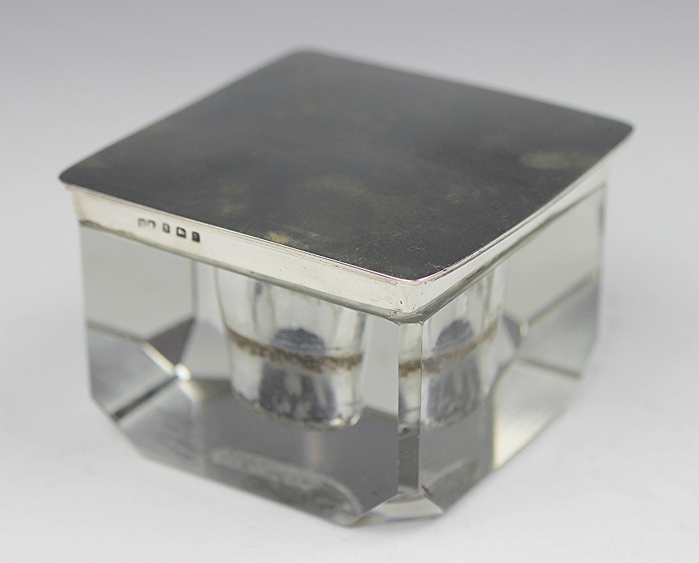 A silver topped Art Deco glass cube inkwell, Henry Matthews, Birmingham 1930, with canted corners,